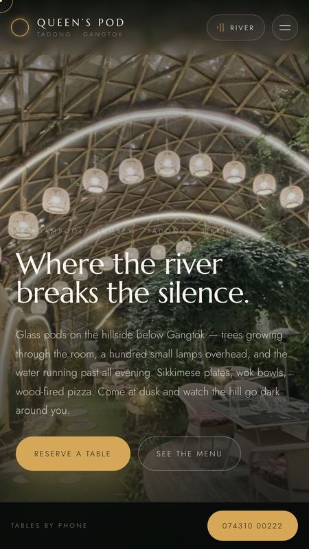 Queen's Pod concept website on a phone