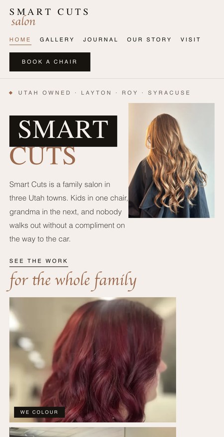 Smart Cuts Salon concept website on a phone